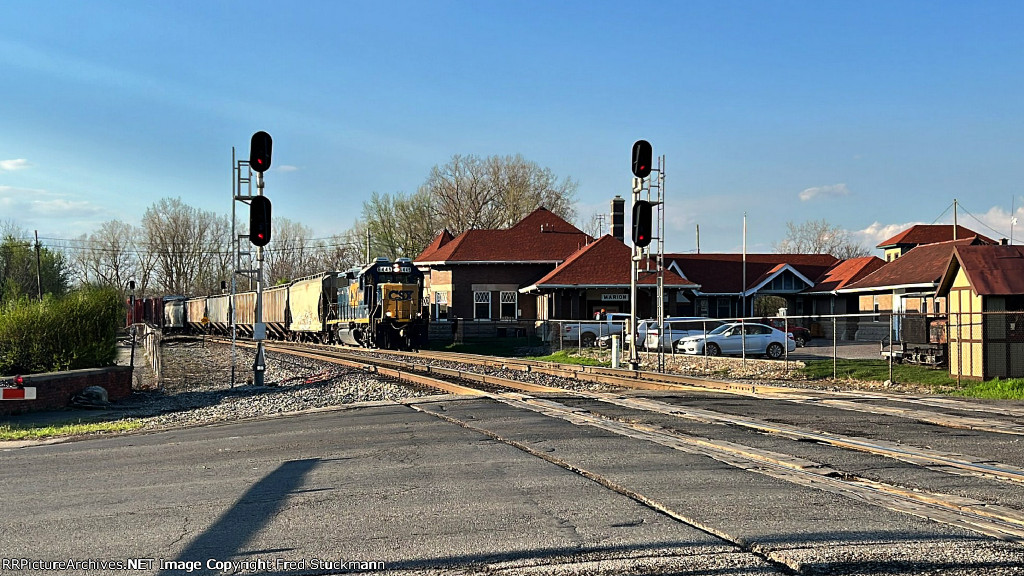 CSX 6445 leads L344 past the station.